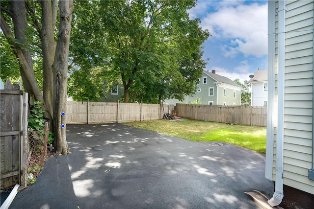 1 Ware St, Providence, RI 02907 - fenced backyard with a patio area