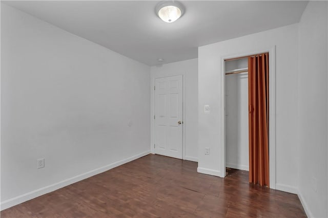 1 Ware St, Providence, RI 02907 - unfurnished bedroom featuring dark wood-type flooring and a closet