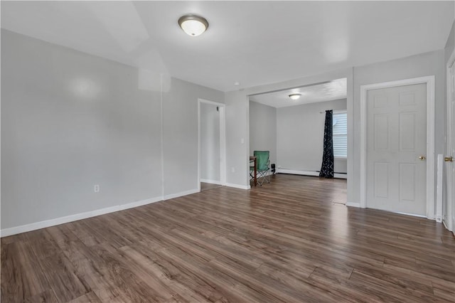 1 Ware St, Providence, RI 02907 - empty room featuring dark wood finished floors and baseboards
