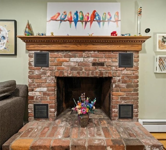 825 Matteson Rd, Coventry, RI 02816 - detailed view of a fireplace and baseboard heating