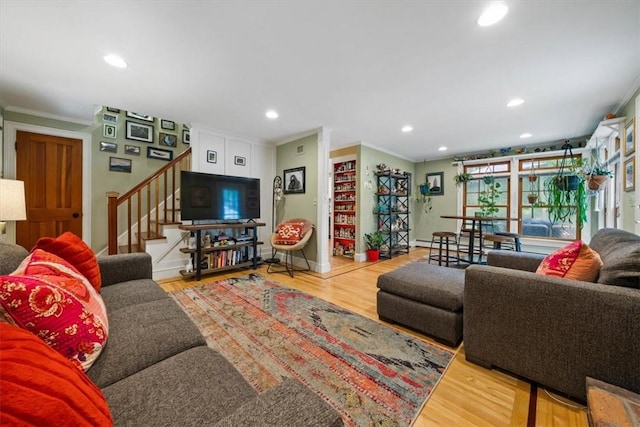 825 Matteson Rd, Coventry, RI 02816 - living room featuring crown molding, stairway, recessed lighting, and wood finished floors