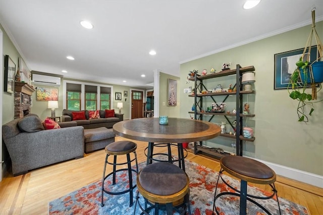 825 Matteson Rd, Coventry, RI 02816 - dining area featuring a wall mounted air conditioner, wood finished floors, crown molding, and recessed lighting