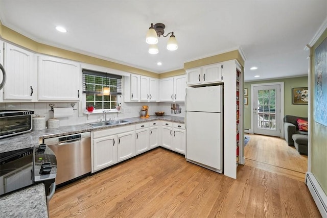825 Matteson Rd, Coventry, RI 02816 - kitchen with freestanding refrigerator, stainless steel dishwasher, baseboard heating, electric range, and crown molding