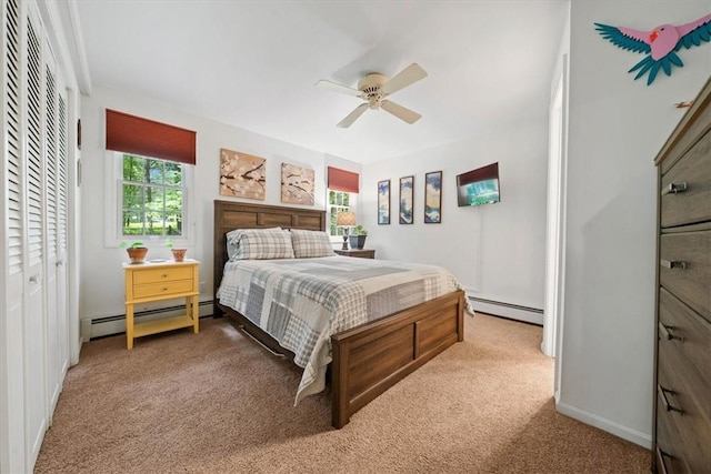 825 Matteson Rd, Coventry, RI 02816 - bedroom with a baseboard heating unit, carpet floors, a ceiling fan, and a closet