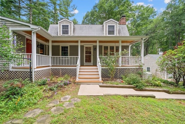 825 Matteson Rd, Coventry, RI 02816 - new england style home featuring covered porch and a chimney