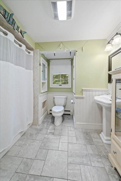825 Matteson Rd, Coventry, RI 02816 - full bathroom featuring wainscoting, a baseboard radiator, and baseboard heating