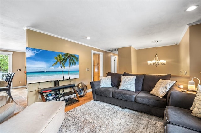18 Magnolia Ln, Coventry, RI 02816 - living area featuring a chandelier, ornamental molding, recessed lighting, and wood finished floors