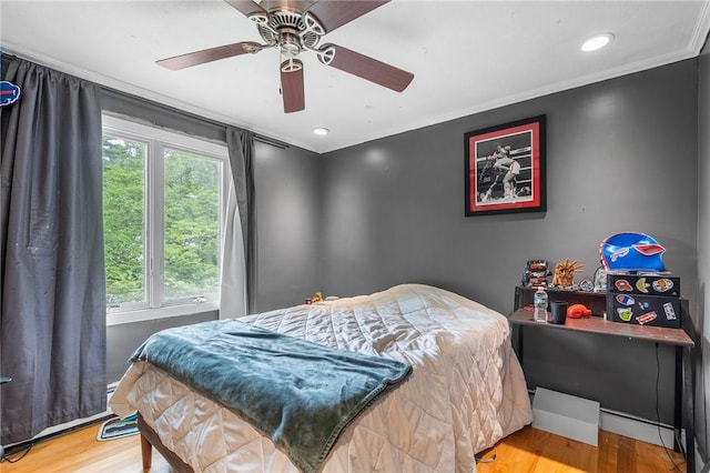 18 Magnolia Ln, Coventry, RI 02816 - bedroom with wood finished floors, ornamental molding, and ceiling fan