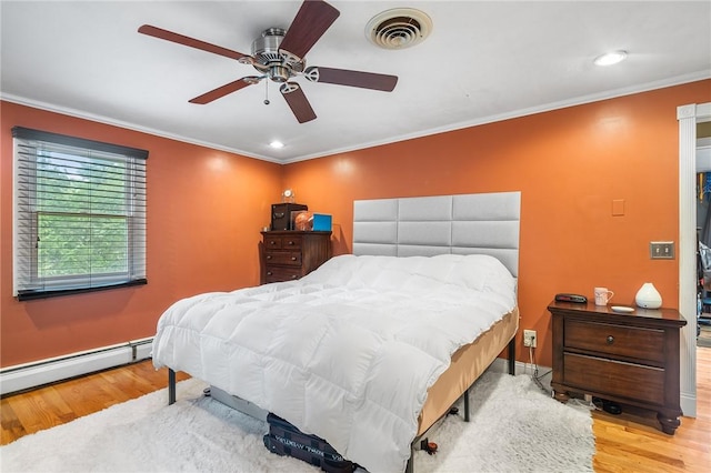 18 Magnolia Ln, Coventry, RI 02816 - bedroom with wood finished floors, a baseboard heating unit, crown molding, recessed lighting, and a ceiling fan