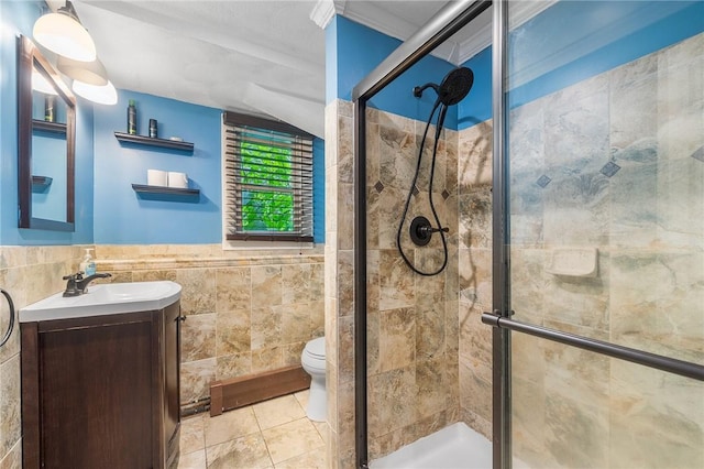 18 Magnolia Ln, Coventry, RI 02816 - full bath featuring tile walls, a stall shower, vanity, tile patterned flooring, and wainscoting