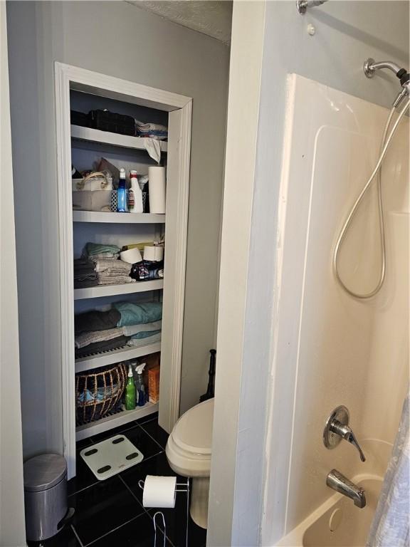 250 Arnold Rd, Coventry, RI 02816 - bathroom with shower / bathtub combination with curtain and tile patterned flooring
