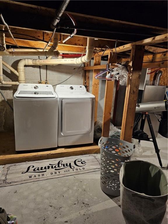 250 Arnold Rd, Coventry, RI 02816 - unfinished basement featuring washing machine and dryer