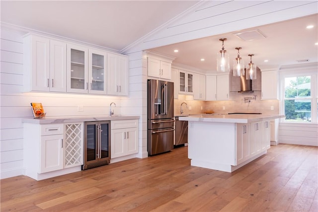5 Williams St Unit 4, Warwick, RI 02818 - kitchen featuring high quality fridge, wine cooler, light countertops, light wood-style floors, and ornamental molding