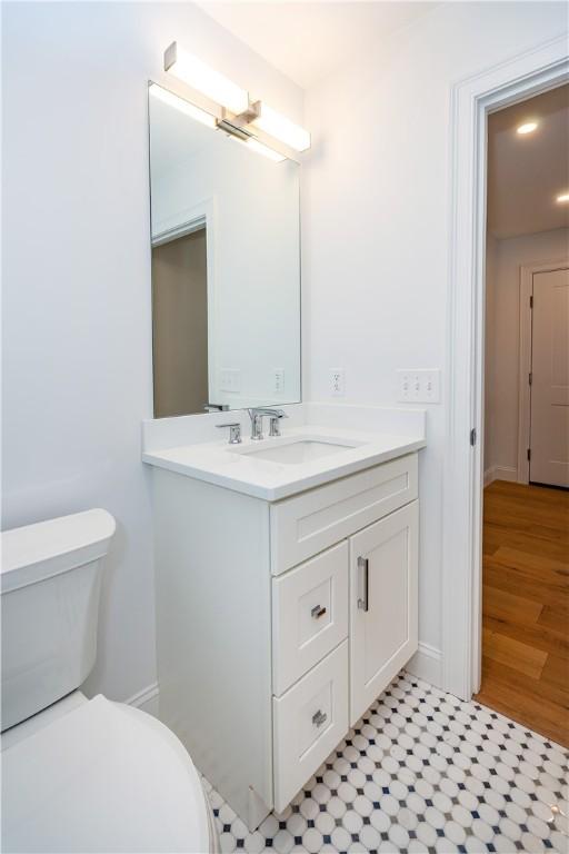 5 Williams St Unit 4, Warwick, RI 02818 - bathroom featuring vanity and toilet