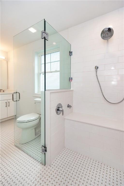 5 Williams St Unit 4, Warwick, RI 02818 - full bathroom featuring a tile shower and vanity
