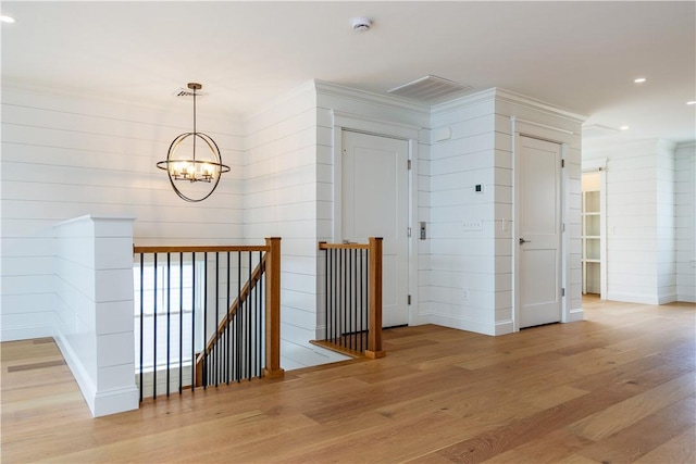 5 Williams St Unit 4, Warwick, RI 02818 - hall featuring an upstairs landing, a chandelier, wood finished floors, and recessed lighting