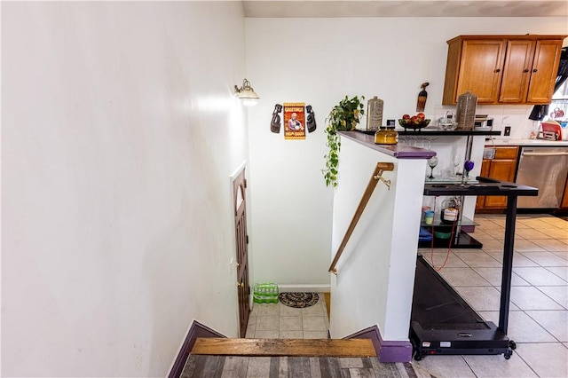 61 Cyr St, Providence, RI 02905 - staircase with tile patterned flooring and baseboards