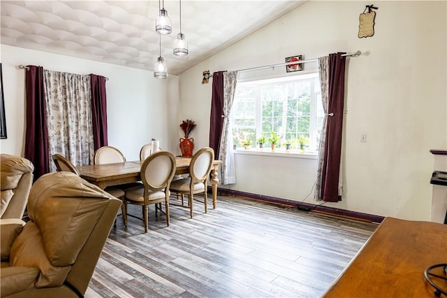 61 Cyr St, Providence, RI 02905 - dining room with vaulted ceiling and wood finished floors