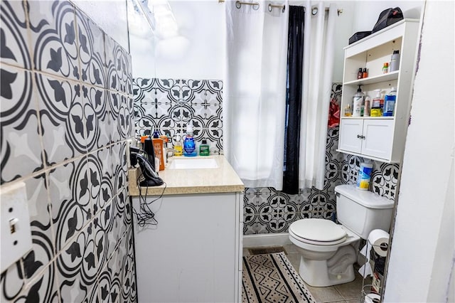 61 Cyr St, Providence, RI 02905 - bathroom with vanity and tile patterned flooring