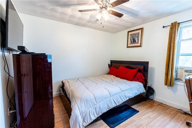 61 Cyr St, Providence, RI 02905 - bedroom with wood finished floors and a ceiling fan