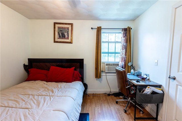 61 Cyr St, Providence, RI 02905 - bedroom with cooling unit and wood finished floors