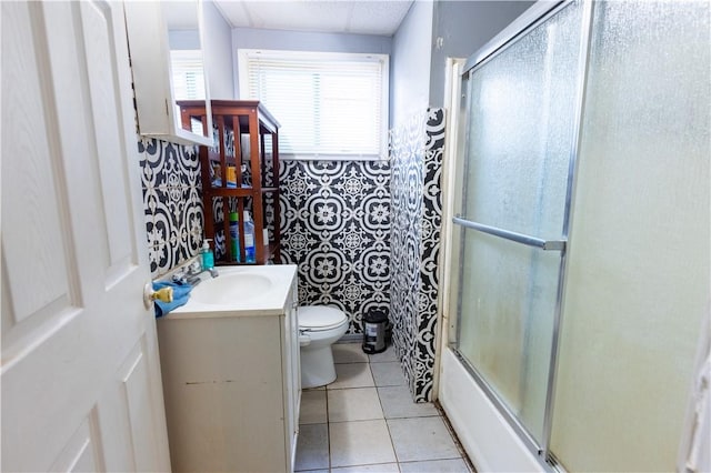 61 Cyr St, Providence, RI 02905 - bathroom with vanity, tile patterned floors, and enclosed tub / shower combo