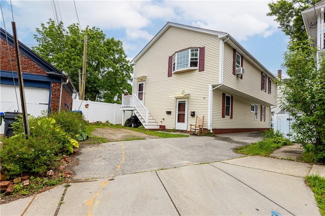 61 Cyr St, Providence, RI 02905 - view of front of property featuring driveway and a garage