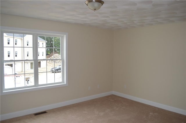 75 Esmond St Unit 5D, West Warwick, RI 02893 - carpeted spare room featuring baseboards