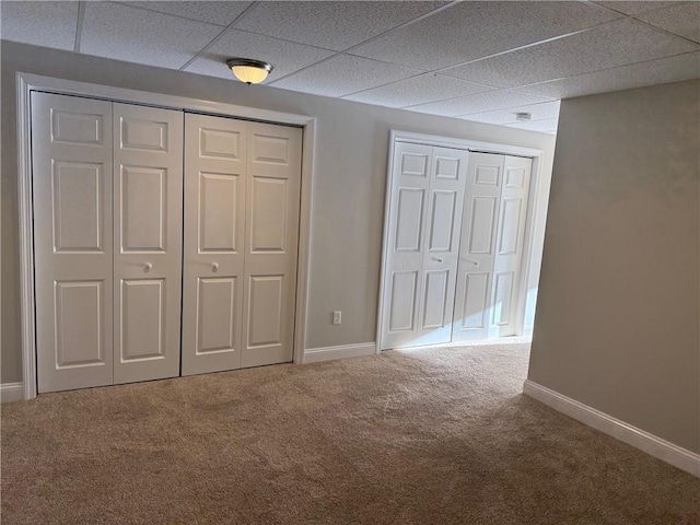 75 Esmond St Unit 5D, West Warwick, RI 02893 - unfurnished bedroom featuring carpet and a paneled ceiling