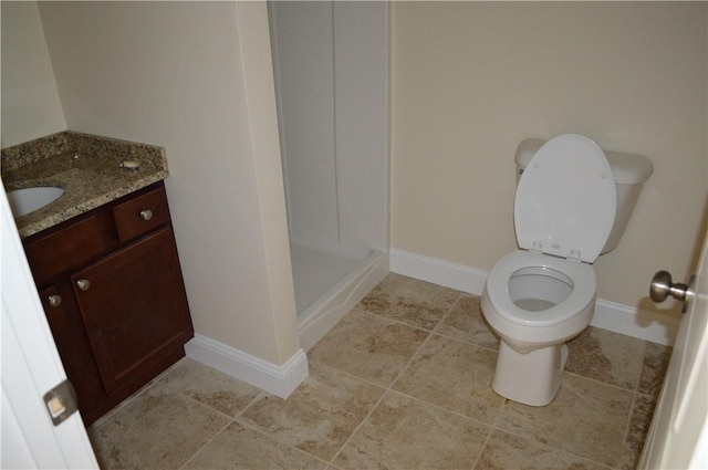 75 Esmond St Unit 5D, West Warwick, RI 02893 - bathroom featuring vanity, a shower stall, and tile patterned floors