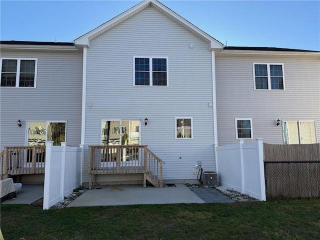 75 Esmond St Unit 5D, West Warwick, RI 02893 - back of property with a wooden deck and a patio area