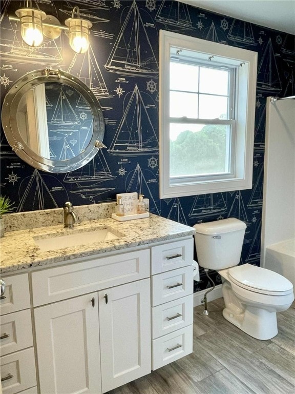 21 Helm St, Jamestown, RI 02835 - full bathroom with vanity and wood finished floors