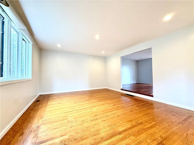 74 Plymouth Rd, East Providence, RI 02914 - empty room featuring wood finished floors and recessed lighting