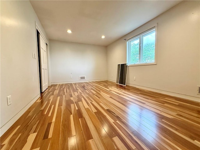74 Plymouth Rd, East Providence, RI 02914 - spare room with wood finished floors and recessed lighting