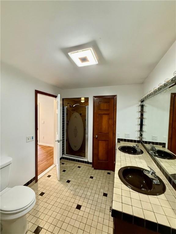 74 Plymouth Rd, East Providence, RI 02914 - bathroom featuring double vanity and a stall shower