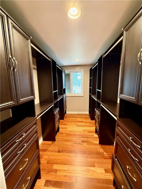 74 Plymouth Rd, East Providence, RI 02914 - spacious closet with light wood-type flooring