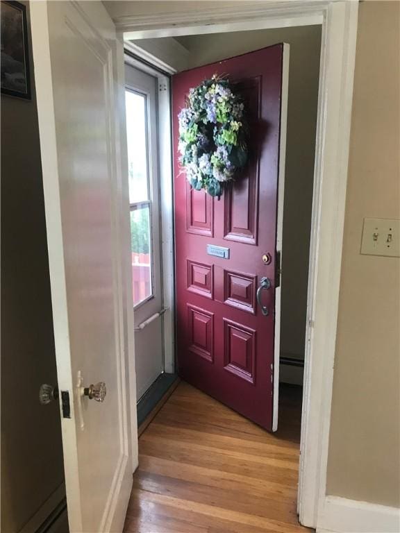 16 Edgemere Rd, Pawtucket, RI 02861 - entryway with light wood-type flooring and baseboard heating