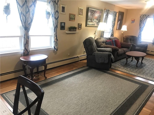 16 Edgemere Rd, Pawtucket, RI 02861 - living area with wood finished floors and baseboard heating