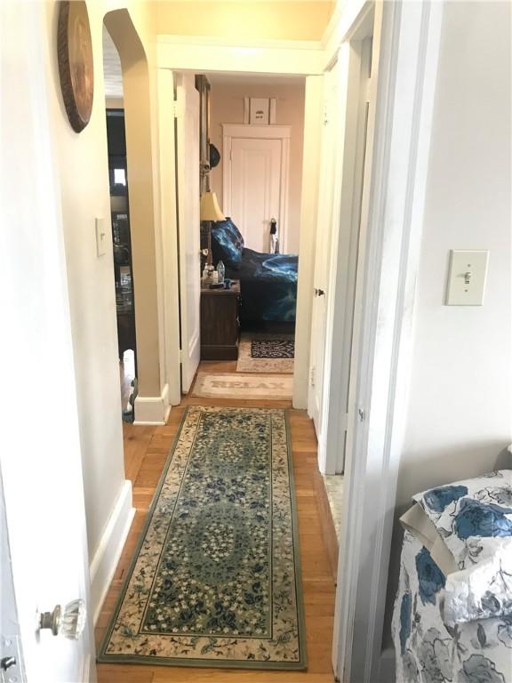16 Edgemere Rd, Pawtucket, RI 02861 - hallway with arched walkways and light wood-type flooring