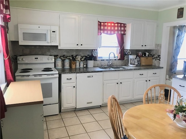 16 Edgemere Rd, Pawtucket, RI 02861 - kitchen featuring white appliances, white cabinetry, decorative backsplash, light tile patterned floors, and crown molding