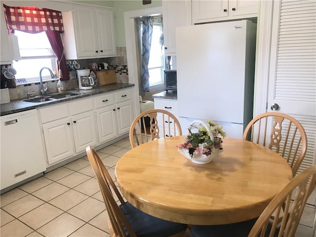 16 Edgemere Rd, Pawtucket, RI 02861 - dining area featuring light tile patterned floors