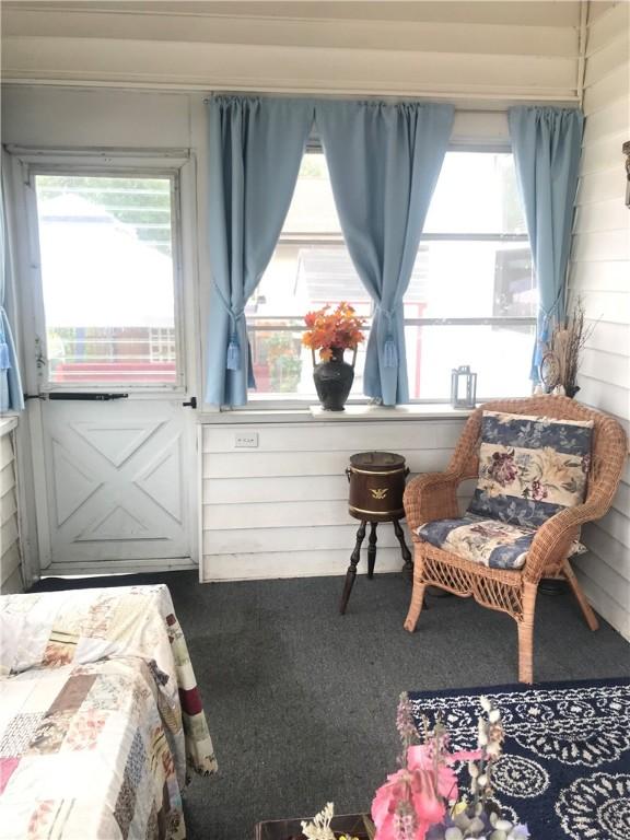 16 Edgemere Rd, Pawtucket, RI 02861 - carpeted bedroom featuring multiple windows