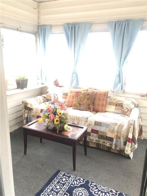 16 Edgemere Rd, Pawtucket, RI 02861 - sunroom featuring carpet floors