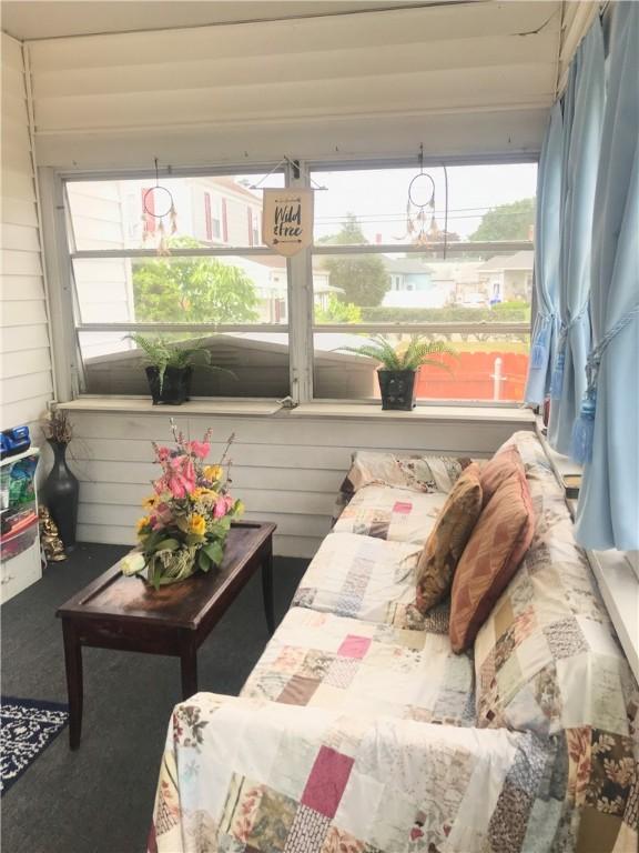 16 Edgemere Rd, Pawtucket, RI 02861 - sunroom featuring an outdoor hangout area