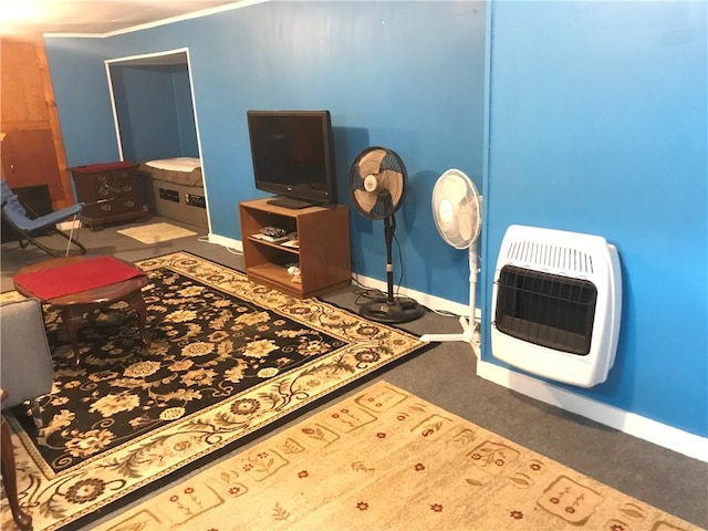 16 Edgemere Rd, Pawtucket, RI 02861 - carpeted living room with heating unit and baseboards
