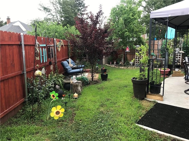 16 Edgemere Rd, Pawtucket, RI 02861 - fenced backyard with a gazebo