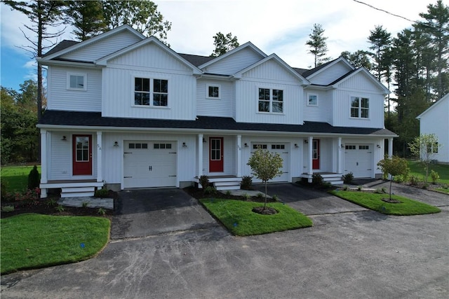 7 Carolina Nooseneck Rd Unit C, Richmond, RI 02898 - modern farmhouse style home featuring an attached garage, driveway, and entry steps