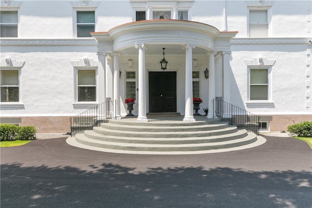 519 Bellevue Ave Unit 2N, Newport, RI 02840 - property entrance with stucco siding and brick siding