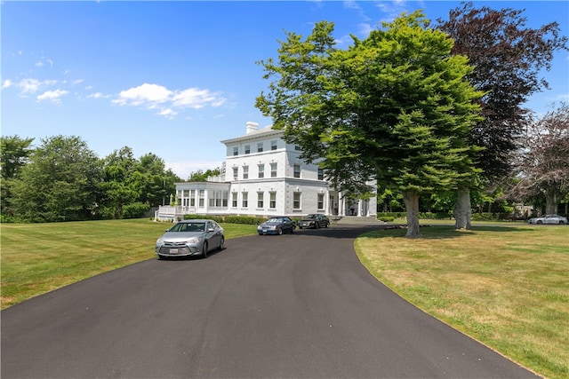519 Bellevue Ave Unit 2N, Newport, RI 02840 - italianate house with a front lawn and a chimney