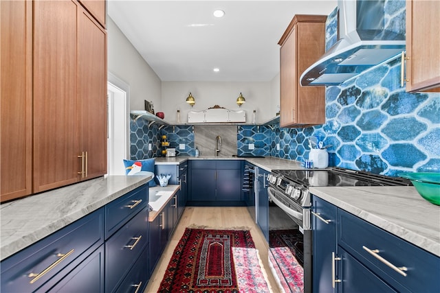 519 Bellevue Ave Unit 2N, Newport, RI 02840 - kitchen with electric stove, extractor fan, tasteful backsplash, blue cabinets, and light wood-type flooring